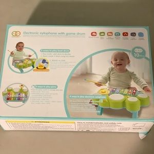 Electronic xylophone with game drum. Baby toy. 10 months and up.